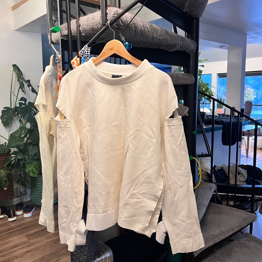 Elegant Cream Distressed Sweatshirt